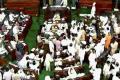 Lok Sabha adjourned for day amid uproar over Telangana - Sakshi Post