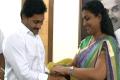 Roja ties &#039;rakhi&#039; to YS Jagan - Sakshi Post