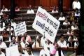 Lok Sabha speaker suspends 25 Congress MPs - Sakshi Post