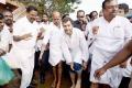 Minister holds out slippers for Rahul Gandhi - Sakshi Post