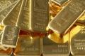 Gold in the global markets on Monday was trading one percent higher in early trade around $1325 per ounce. - Sakshi Post