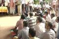 Employees sitting in protest over pay commission - Sakshi Post