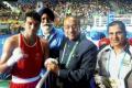 Minister of State for Youth Affairs and Sports (I/C) Vijay Goel greets Indian Boxer Manoj Kumar at Rio de Janeiro on Wednesday. Boxing Coach Shri G.S. Sandhu is also seen. (file photo: PTI) - Sakshi Post