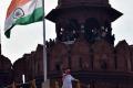 Prime Minister Narendra Modi waves to the gathering from the ramparts of the Red Fort on the occasion of Independence Day. - Sakshi Post