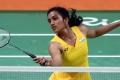 In a hard-fought final,Sindhu went down 21-19 12-21 15-21 to the Spaniard world number one Carolina Marin - Sakshi Post