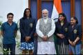 Prime Minister Narendra Modi with the Olympians, on Sunday. - Sakshi Post