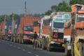 Trucks lines up at a toll gate.&amp;amp;nbsp; - Sakshi Post