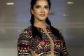 Leone opened the show in a beautiful and vibrant gown - Sakshi Post