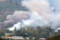 Smoke rising from the attack on the army camp Smoke rising from the attack on the army camp - Sakshi Post