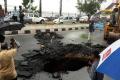 Large sink hole that appeared overnight on Necklace Road - Sakshi Post