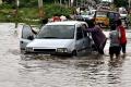 The normal life citizens has come to a standstill in the city due to the continues downpours for a week - Sakshi Post