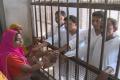 Prisoners being tied rakhis at Jaipur central jail - Sakshi Post