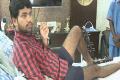 Nikhil Reddy, who is unable to walk after the surgery - Sakshi Post