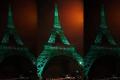 The Eiffel Tower and the Arc de Triomphe in Paris weretemporarily lit - Sakshi Post