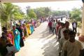 Candidates waiting to enter an exam center in Hyderabad - Sakshi Post