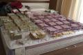 Rs4.7 crore cash in new denominations of Rs2000 and Rs30 lakh in other denominations were found in a flat owned by a civil contractor in Bengaluru. - Sakshi Post