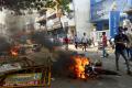 Furious that they had been ousted from the beach, the pro-Jallikattu protesters set fire to the vehicles parked at the Ice House police station and attacked police personnel with bricks and stones - Sakshi Post