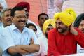 All Smiles: AAP chief is gradually emerging into a rallying point in Punjab elections. - Sakshi Post