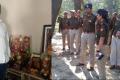 The diseased Vinod and police at the murder spot - Sakshi Post