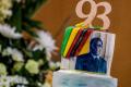 A celebratory cake with the Zimbabwean flag and a portrait of President Robert Mugabe. - Sakshi Post