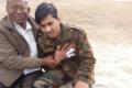 Soldier Chandu Babulal Chavan with a relative Soldier Chandu Babulal Chavan with a relative - Sakshi Post