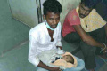 Family member of the deceased with the newborn baby Family member of the deceased with the newborn baby - Sakshi Post