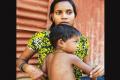 Pramila Rinjad with her son - Sakshi Post