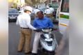 A home guard from the Narayanaguda traffic police station takes bribe from the owner of a two-wheeler - Sakshi Post