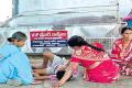 Locals offering food to Achyuth near the body - Sakshi Post