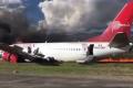 Smoke billowing out of the airliner - Sakshi Post