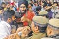 Students clashing with police in Punjab University - Sakshi Post