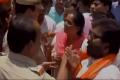 The MP having heated argument with the policemen - Sakshi Post