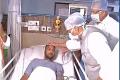 Union Home Minister Rajnath Singh talks to an injured CRPF Jawan - Sakshi Post