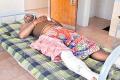 Reporter Rama Reddy undergoing treatment in a hospital - Sakshi Post