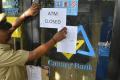 ATM Closed signs popped up at several ATM centers across the country on Monday - Sakshi Post