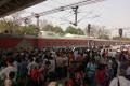 People have a look at the derailed Lokmanya Tilak AC Special Express train in Uttar Pradesh’s Unnao railway station&amp;amp;nbsp; - Sakshi Post