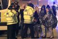Emergency services work at Manchester Arena after reports of an explosion at the venue during an Ariana Grande gig in Manchester, England, on Monday. (Photo: AP)&amp;amp;nbsp; - Sakshi Post