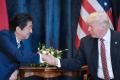US President Donald Trump with  Japanese counterpart Shinzo Abe - Sakshi Post