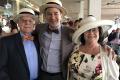 Uber CEO Travis Kalanick with his parents, Donald and Bonnie, at the Kentucky Derby earlier this month. - Sakshi Post