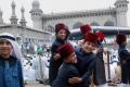 Muslims gather at Mecca Masjid in Hyderabad to offer special prayers on the Eid on Monday. - Sakshi Post