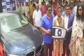Chamudeswarinath gifts BMW to  Mithali Raj at the Pullela Gopichand Badminton Academy - Sakshi Post
