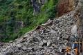 alThe side of the landslide near Dhallii Tunnel - Sakshi Post