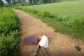 The headless body of Pandav Nayak at Mania nalah, near Olamba village under Ganjam district’s Badagada police station limits of Odisha. - Sakshi Post