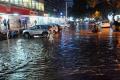 Heavy downpour on Monday evening brought traffic to a standstill while roads were inundated with water. Heavy downpour on Monday evening brought traffic to a standstill while roads were inundated with water. - Sakshi Post