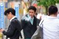 Most companies in Japan have banned smoking in the workplace and set up smoking rooms - Sakshi Post