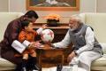PM Narendra Modi meets with Bhutan’s Jigme Khesar Namgyel Wangchuck and his son PM Narendra Modi meets with Bhutan’s Jigme Khesar Namgyel Wangchuck and his son - Sakshi Post