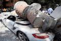 A debris of a building fell on the car after Mexico city was hit by quake  A debris of a building fell on the car after Mexico city was hit by quake  - Sakshi Post