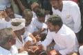 YSRCP president YS Jagan Mohan Reddy interacting with farmers at Y Koduru, on Thursday. - Sakshi Post