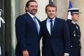 French President Emmanuel Macron (R) with  Lebanese Prime Minister Saad Hariri - Sakshi Post