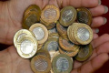 The RBI scoffed at the rumours that the coin was banned The RBI scoffed at the rumours that the coin was banned - Sakshi Post